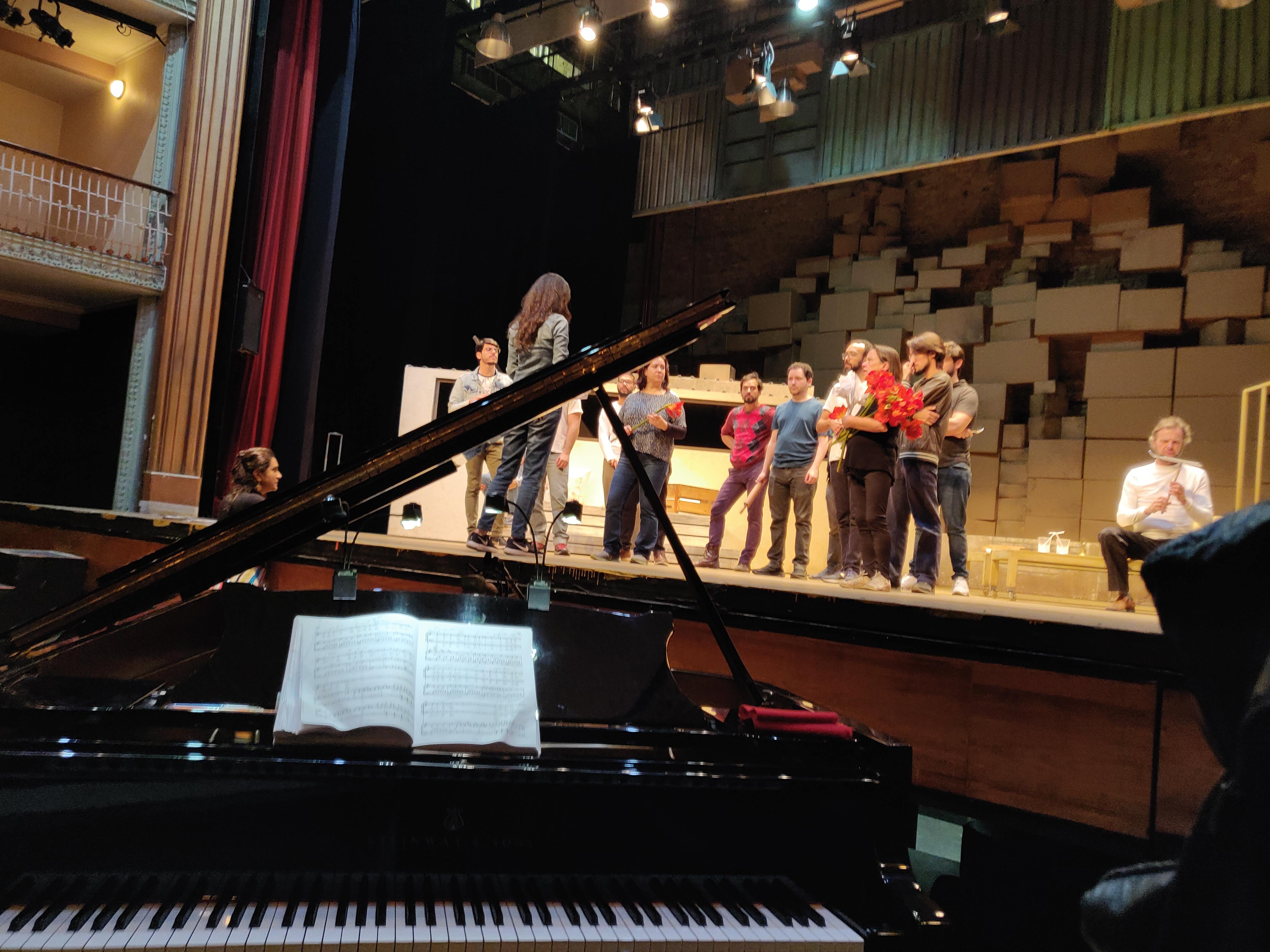 Rehearsal for L'italiana in Algeri, at Theatro Sao Pedro, in Sao Paulo - Brazil. July/August, 2019. With Livia Sabag (stage director), Juliana Santos (assistant stage director), Douglas Hahn (Taddeo), Ana Lucia Benedetti (Isabella), and the singers of the Academia of Theatro Sao Pedro in the choir.